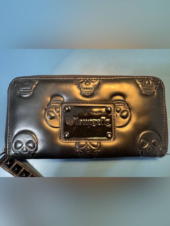 Loungefly Handbags - Loungefly Black Embossed Skull Zip Around Wallet